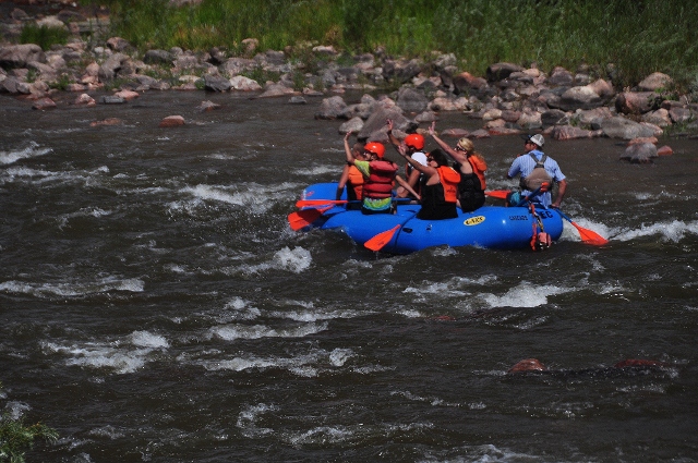 rafters waving at train